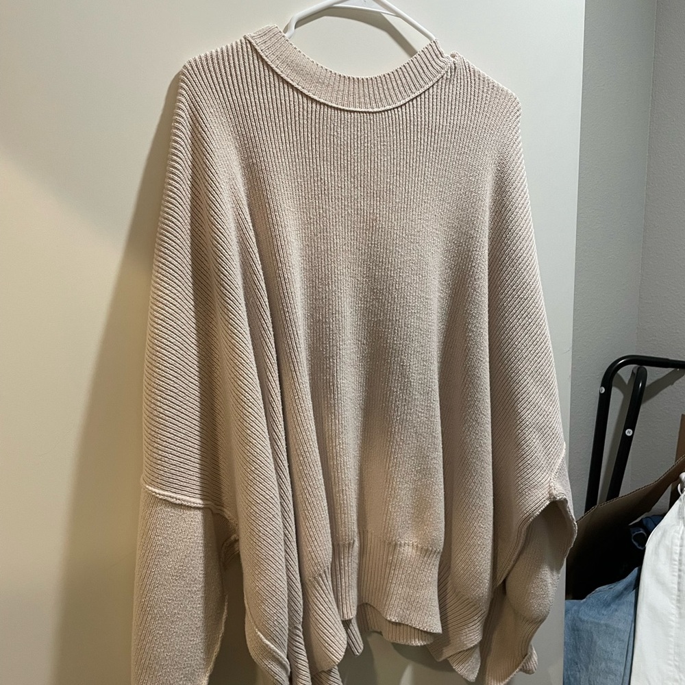 Size medium free people easy street tunic in a cream color.